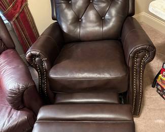 #38	Brown Swivel Leather w/nailhead Electric Recliner	 $200.00 			
#39	Brown Swivel Leather w/nailhead Electric Recliner	 $200.00 			
