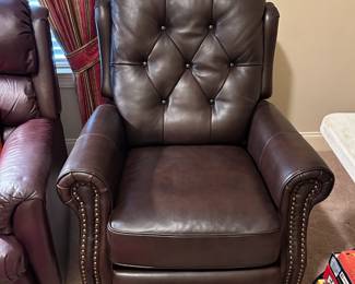 #38	Brown Swivel Leather w/nailhead Electric Recliner	 $200.00 			
#39	Brown Swivel Leather w/nailhead Electric Recliner	 $200.00 			

