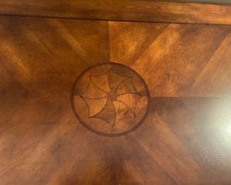 #32	Wood oval End table w/inlay - 47x26x20	 $125.00 			
