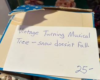 #141	vintage turning musical tree NOTE snow does not fall 	 $25.00 			
