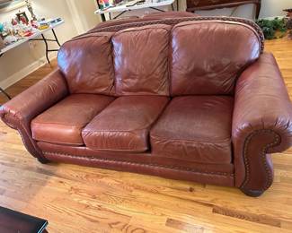 #24	Lane Brown Leather Sofa w/nailhead Trim - 84" Long	 $300.00 			
#25	Lane Brown Leather Loveseat w/nailhead Trim - 64" Long	 $250.00 			
