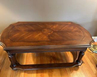 #32	Wood oval End table w/inlay - 47x26x20	 $125.00 			

