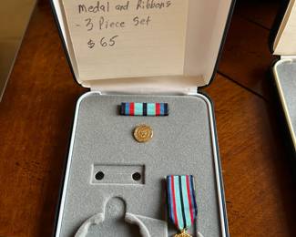 #164	Nasa exceptional achieving medal and ribbons 3 piece set	 $65.00 			
