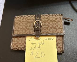#63	Classic Coach Tri-fold Wallet	 $20.00 			
