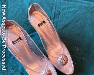 Stuart Weitzman clear pumps with Pink Rhinestone Embellishment