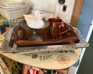 cake plates, ducks, copper mugs, cook books
