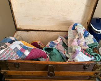 Trunk and old quilts 