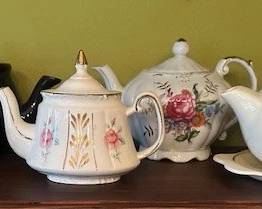 Vintage copper lusterware creamers, Vintage Price & Kensington teapot,  teapot from Salem China Company and a Tilso musical teapot.