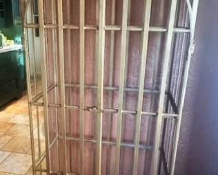 Gold-tone metal cocktail bar or shelving unit with an ornate caged design.  (Glass shelves are included (4) and packed to move)