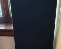 2 Polk Audio floorstanding tower speakers.