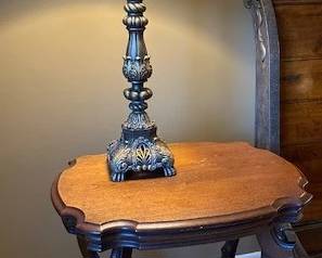 Traditional style table lamp with fabric shade and Antique Victorian walnut parlor table. 