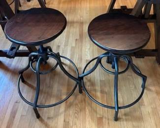 2 adjustable stools, iron and wood.