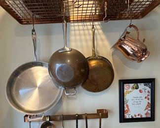 Copper and stainless pots, measuring cups, pitcher, etc.