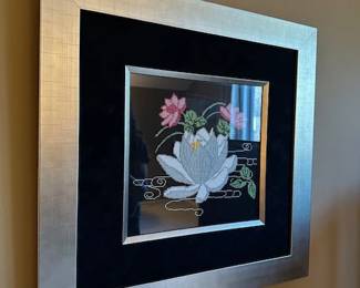 Framed Vietnamese artwork featuring a hand-stitched lotus flower design.