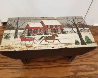 Painted footstool by Betty Fischer. 