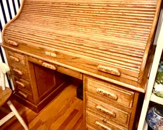 Large roll top desk with many drawers and hiding spots!