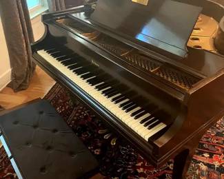 Beautiful Baldwin Model B Baby Grand Piano, serial number B75213, crafted circa 1936-1937 in Cincinnati, Ohio. This distinguished instrument showcases Baldwin's patented acoustic construction and the celebrated Grand Prix Paris 1900 / St. Louis 1904 cast-iron plate inscription, honoring the brand's world-fair achievements.
Believed to have been purchased by the client's grandfather at WSM Radio, home of the legendary Grand Ole Opry. Features genuine gorgeous keys that are in working condition. Measures approximately 67"H x 56"W x 64"D, a true heirloom piece combining musical heritage and timeless craftsmanship.