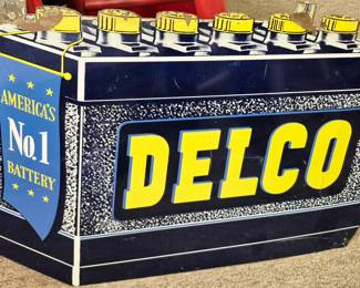 Great variety of advertising signs. Vintage "Delco America's No. 1 Battery" metal sign