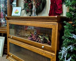 Modern 2 section oak bookcases w/ glass front doors