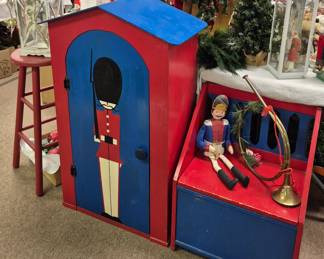 Nutcrackers and related items. Vintage child's nutcracker toy box and cabinet