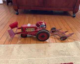 VINTAGE METAL TOY TRACTOR WITH 3 BOTTOM PLOW