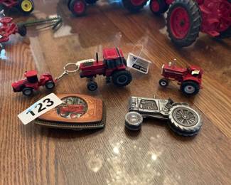 3 TOY TRACTORS, A BELT BUCKLE, OLIVER KNIFE