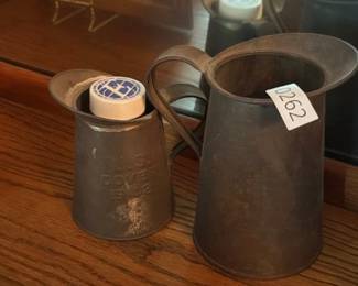 TWO METAL VINTAGE OIL CANS