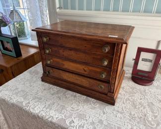 ANTIQUE SPOOL CABINET