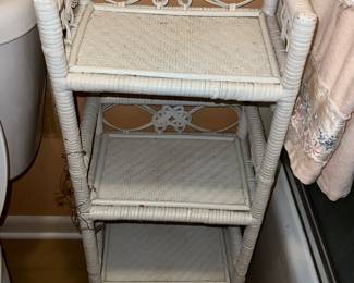 white wicker three-tiered etagère