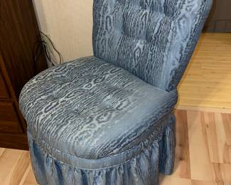 vintage-style upholstered vanity chair with a skirted base