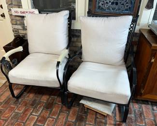 Pair of black metal spring high back outdoor lounge chairs