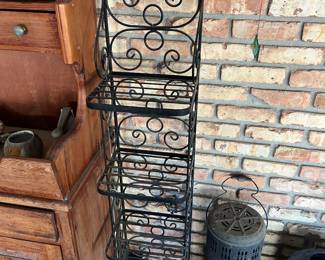 Black wrought iron bakers rack plant stand