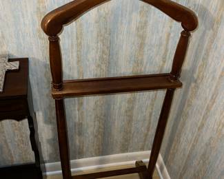 valet stand with brass-tone accents