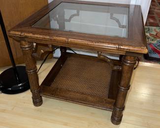 vintage bamboo and rattan end table with a glass top