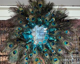 handmade peacock feather mirror