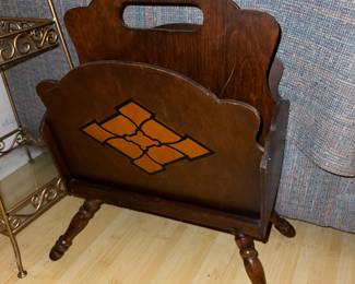 vintage wooden magazine rack with an art deco design