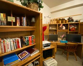 Nice office furniture including desks and a cabinet on wheels.