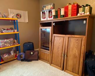Child shelf with matching collapsible basket, entertainment center with doors removed for easier moving.