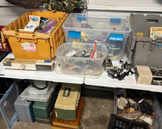 Fishing stuff. 15 or so rods & reels, plastic, crank bait, tackle boxes(new and vintage)