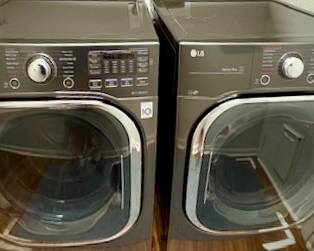 LG Black Stainless  Frontload Washer and Dryer Set. Will Pre Sell
