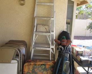 Ladders & Bagged Golf Clubs
