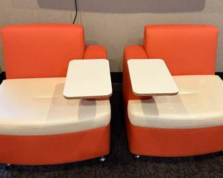 Orange and White chairs with trays