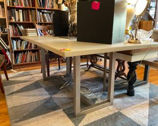 Stone and brushed steel, dining room table. Fits up to 8 people. $350 +tax
