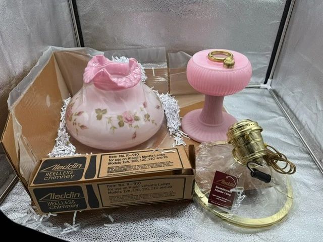 Fenton Rosalene Aladdin lamp. Like new. https://modestlambestatesales.hibid.com/