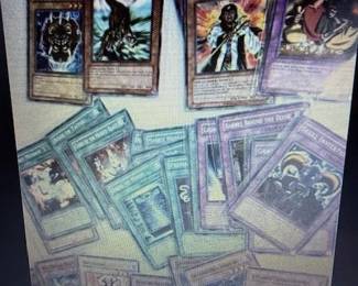 Trading game cards. https://modestlambestatesales.hibid.com/