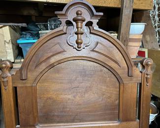 One of 2 similar antique twin beds