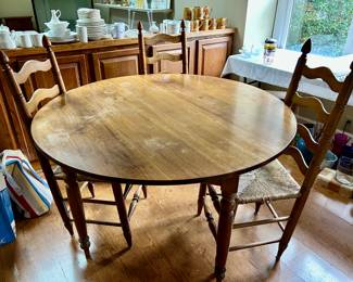 round kitchen table and 3 ladderback chairs
