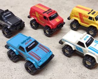 (5) 1980s McDonalds Stompers Truck Toys