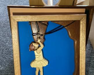 Hand Carved Girl Giving Horse a Kiss