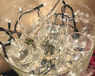 Glass goblets nestled in their punch bowl ....ready for table talk